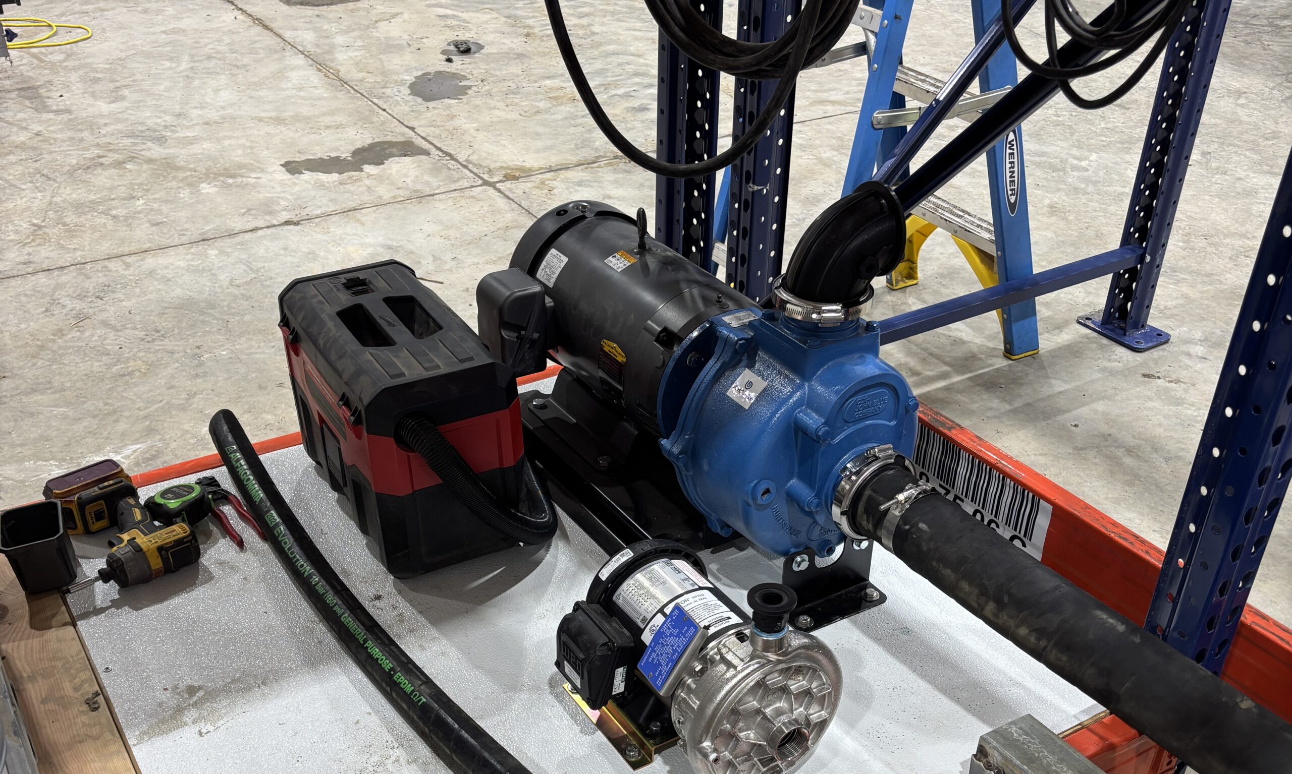 John Blue SP-3350-E15TBFLG mounted stationary on pallet rack shelf.