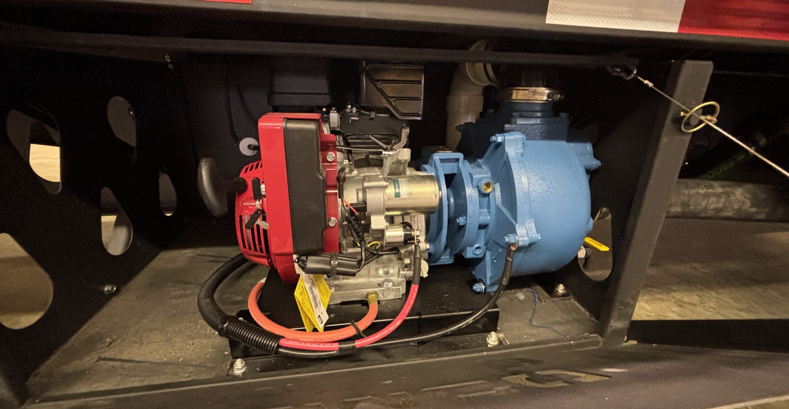 John Blue SP-3350-G13HFLG installed in a storage box on a Demco 42' liquid tender, fuel tank removed.